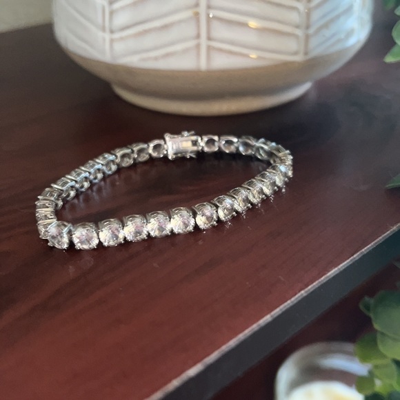 Sterling Silver Lab created sapphire tennis bracelet. - Picture 4 of 6